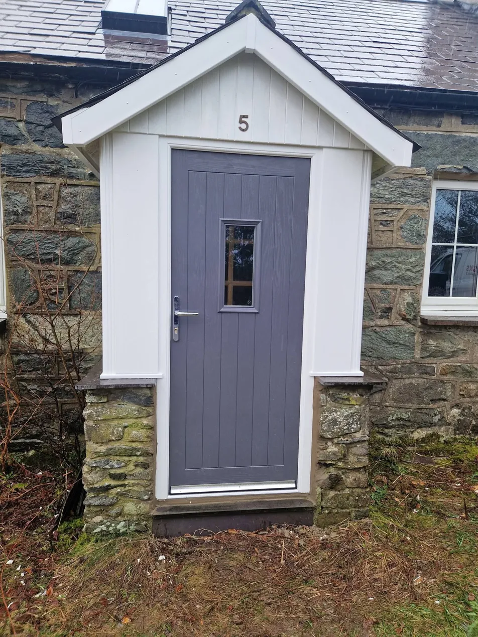 Composite door & porch, stone cottage